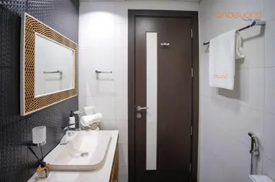 a bathroom with a sink and a mirror at Bnbeyond Contemporary Living in Business Bay in Dubai