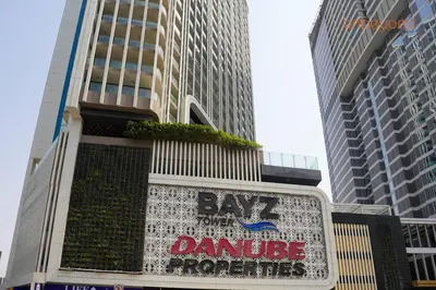 a building with a sign that reads bay dance performance at Bnbeyond Contemporary Living in Business Bay in Dubai