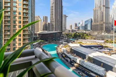 a view of a city with tall buildings at Durrani Homes - Minimal Luxe 3BR with Burj Khalifa and fountain view - third room without partition in Dubai