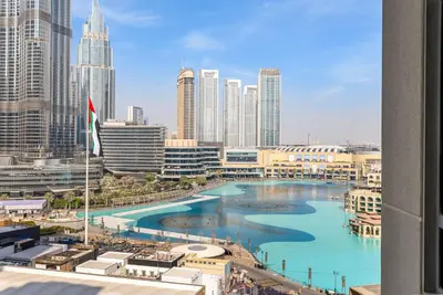 a view of a city with a large pool of water at Durrani Homes - Minimal Luxe 3BR with Burj Khalifa and fountain view - third room without partition in Dubai