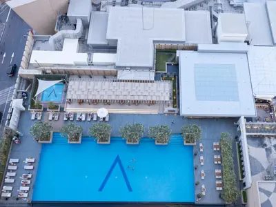 an aerial view of a hotel with a swimming pool at Emaar Residenc Fashion Avenue - Sokoon in Dubai