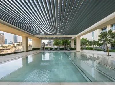 an empty swimming pool in a building at Burj Royale 1BR - Close to Burj Khalifa and Dubai Mall in Dubai