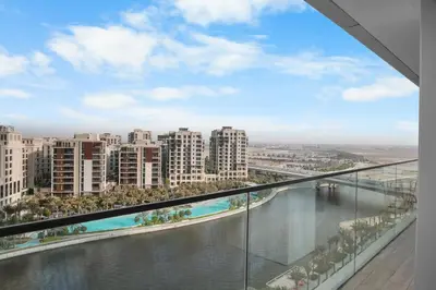 a view of a river from the balcony of a building at Palace Residence Chic 2BR Creek Beach View in Dubai