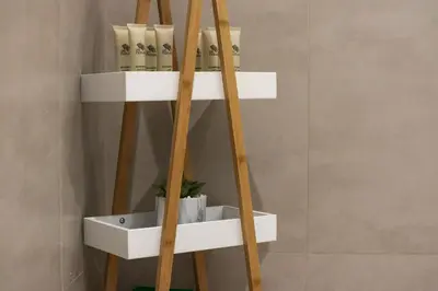 a shelf in a bathroom with white shelves at Stylish 4BD Villa Opposite Pool & Park in Dubai