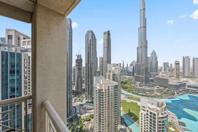 a view of a city skyline from a balcony at Breathtaking Burj Khalifa & Fountain Views! in Dubai