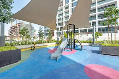 a playground in a building with a slide at Elegant Studio Retreat in the Heart of Dubai in Dubai