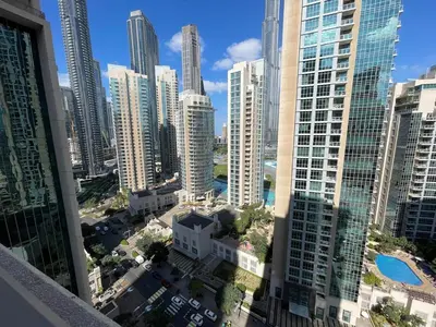 a view of a city from a skyscraper at 2BR apartment in the Heart of Downtown Dubai with Burj Khalifa View by Norbu Holiday Homes in Dubai