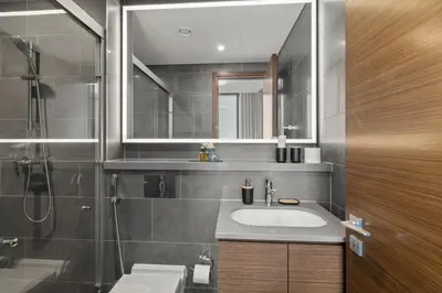 a bathroom with a sink and a shower at Premium Stay in Sobha 1BR with Extra Room and Balcony in Dubai