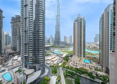 an aerial view of a city with tall buildings at Act One Luxury 2BR Front-Row Burj & Fountain Views in Dubai