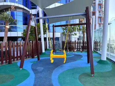 a playground in a building with a swing at Your Hollywood-Style Hideaway -DAMAC Paramount in Dubai