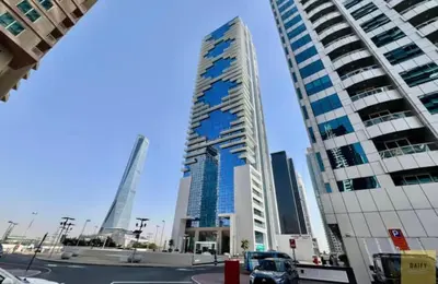 a group of tall buildings in a city at Modern 1BR with city views large space in Dubai