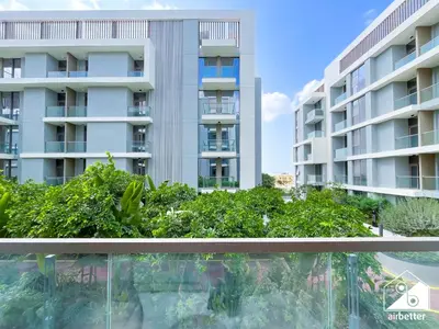 an image of an apartment building from a balcony at Spacious 1-BR with Balcony & Leisure Facilities in Dubai