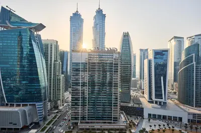 a view of a city with tall buildings at Stylish 1BR Apartment, ZADA Tower with Pool & Gym, Business Bay in Dubai