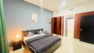 a bedroom with a bed in a room at Marina View Retreat 1BR In Escan Tower Marina in Dubai