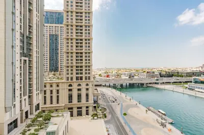 a view of a city with tall buildings and a river at RH Luxe Vibes 2BR Al Habtoor City, Mesmerizing Canal View in Dubai