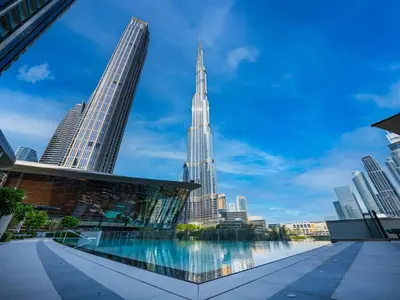 a view of the chicago city skyline from the river at Iconic Burj Khalifa & Fountain Views, Luxury 2BR Downtown in Dubai