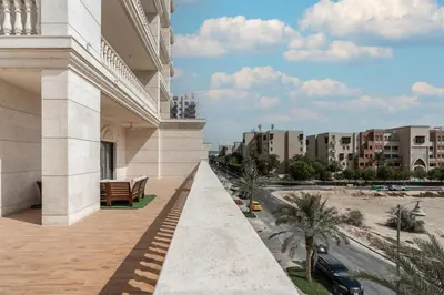 a balcony of a building with a view of a street at Elegant 2Bhk Panorama Apartment in Dubai