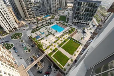 an aerial view of a street in a city at Stylish 1BR Dubai Hills Walk to Park & Mall in Dubai