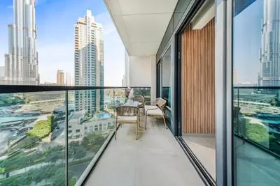 a balcony with a view of a city at Act 2 - Luxury 2BR Facing Burj Khalifa & Fountain in Dubai