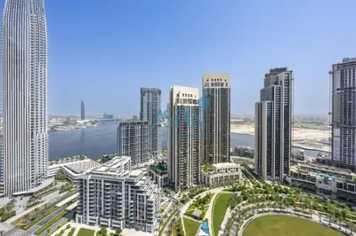 an aerial view of a city with tall buildings at Aspin 1BHK Waterfront View - Creek Horizon in Dubai