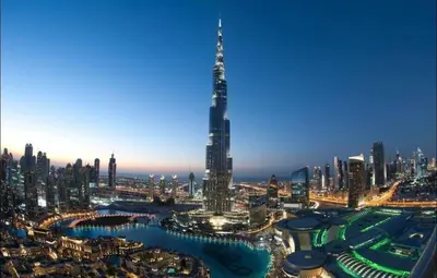 a view of a city with a tall skyscraper at Green Heaven Partition Room in Green View 3 in Dubai