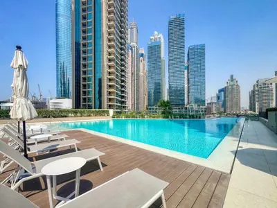 a swimming pool with a view of a city skyline at Exclusive Marina Lifestyle with Stunning Views in Dubai