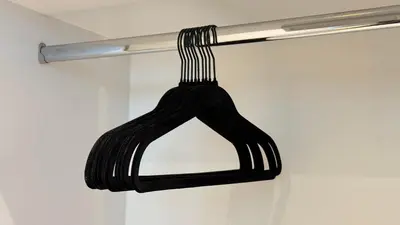 a black object is hanging from a pole at LUX 1BR 5 Min Walk Dubai Mall - DAMAC Upper Crest in Dubai