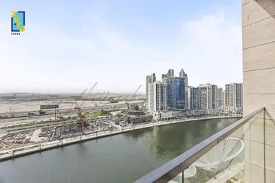 a view of a river in a city with buildings at Timeless & Textured Studio w Jacuzzi Trillionaire in Dubai