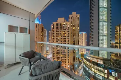 a balcony with a view of a city skyline at FIRST CLASS 1BR Marina Skyline Escape in Dubai