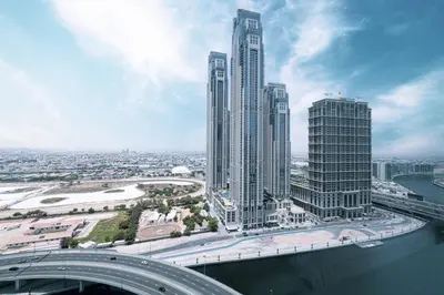 an aerial view of a city with tall buildings at Stylish 1BR Canal View Apartment Business Bay in Dubai