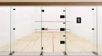 a room with a basketball court with two doors at Grand 1bhk burj khalifa view Downtown in Dubai