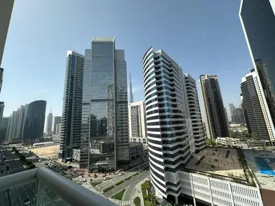 a view of a city with tall buildings at Damac Maison Prive in Dubai
