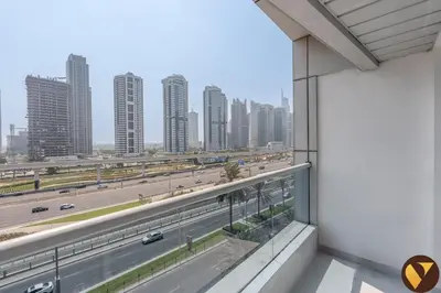 a view of a city skyline from a building at Vogue Marina Diamond Near JBR Beach and Marina Mall, One Bedroom Apartment with Balcony and City View, Access to all Amenities, Walkable to Sobha Realty Metro Station and Bus Stop in Dubai