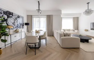 a living room with a couch and a table at Amazing 2 bedroom with Sea view ! Rimal ! in Dubai