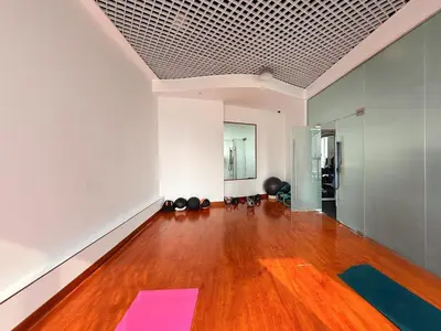 an empty room with yoga mats on a wooden floor at GuestReady - Spectacular Marina Views | High Floor in Dubai