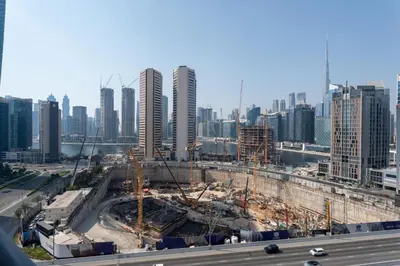 a construction site in a city with tall buildings at GuestReady - Dubai Skyline & Canal View | 1 BHK in Dubai