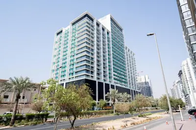 a tall building in the middle of a city at Stylish High-Floor Studio in Binghatti Azure! in Dubai