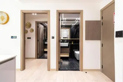 a bathroom with a sink and a toilet in a room at Apartment in Binghatti Crescent, Next to Circle Mall in Dubai