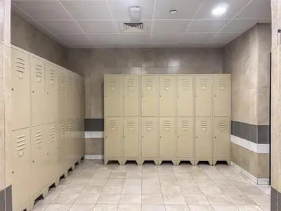a row of lockers in a locker room at Chic Studio in JVC near Butterfly and Miracle Garden in Dubai