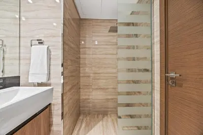 a staircase in a bathroom with a sink and a shower at Millionaire Residence-Infinity Pool-Business Bay in Dubai