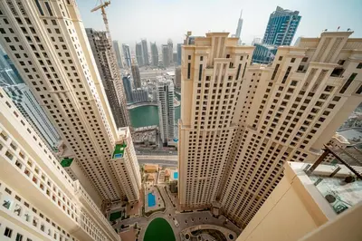 an aerial view of a city with tall buildings at HiGuests - Fancy 1BR Apt With Aerial Marina Views in JBR in Dubai