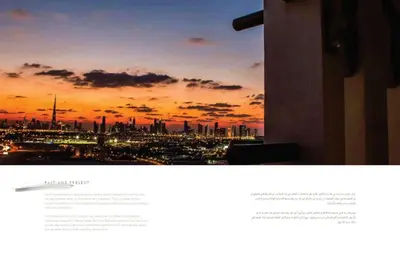 a view of a city skyline at sunset at Exotic 2 bed downtown Burj Khalifa dist Dubai mall in Dubai