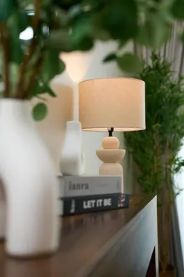 a lamp sitting on top of a table at Luxury 1BR Apt Dowtown Dubai Imperial Avenue with Burj Khalifa Views in Dubai