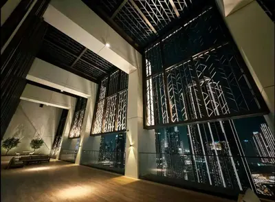 a room with stained glass windows in a building at Mahogany 18 - 2BR 10 Guests - Walk to Dubai Mall in Dubai