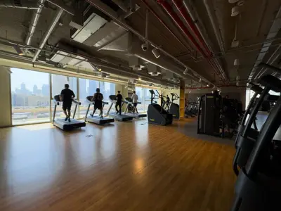 a group of people doing pilates in a gym at Infinity Pool Walk to Burj Khalifa Downtown 1BR in Dubai