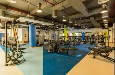 a gym with lots of equipment in a room at Breathtaking Sea View and Dubai Eye 2BR in Dubai