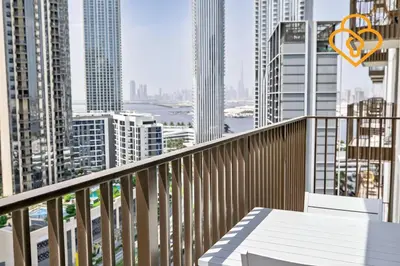a balcony with a view of a city at Keysplease Beautiful 2 BR Creek Crescent Water View, Harbour in Dubai