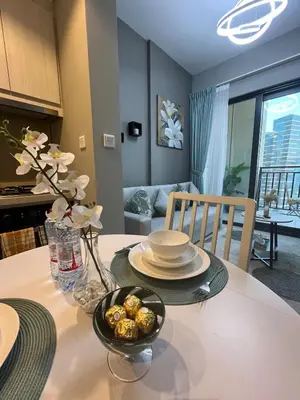 a dining room table with a bowl of food on it at Cosy flat in the heart of Dubai in Dubai