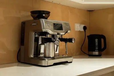 a coffee maker sitting on top of a counter at Penthouse four bedroom with two large chillout terraces in Dubai