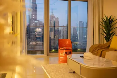 a living room with a view of a city at Luxury 2BHK in DownTown with Burj Khalifa View Imperial 2415 in Dubai